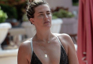 Caught in a Candid Poolside Moment: Can You Recognize This Famous Model?..
